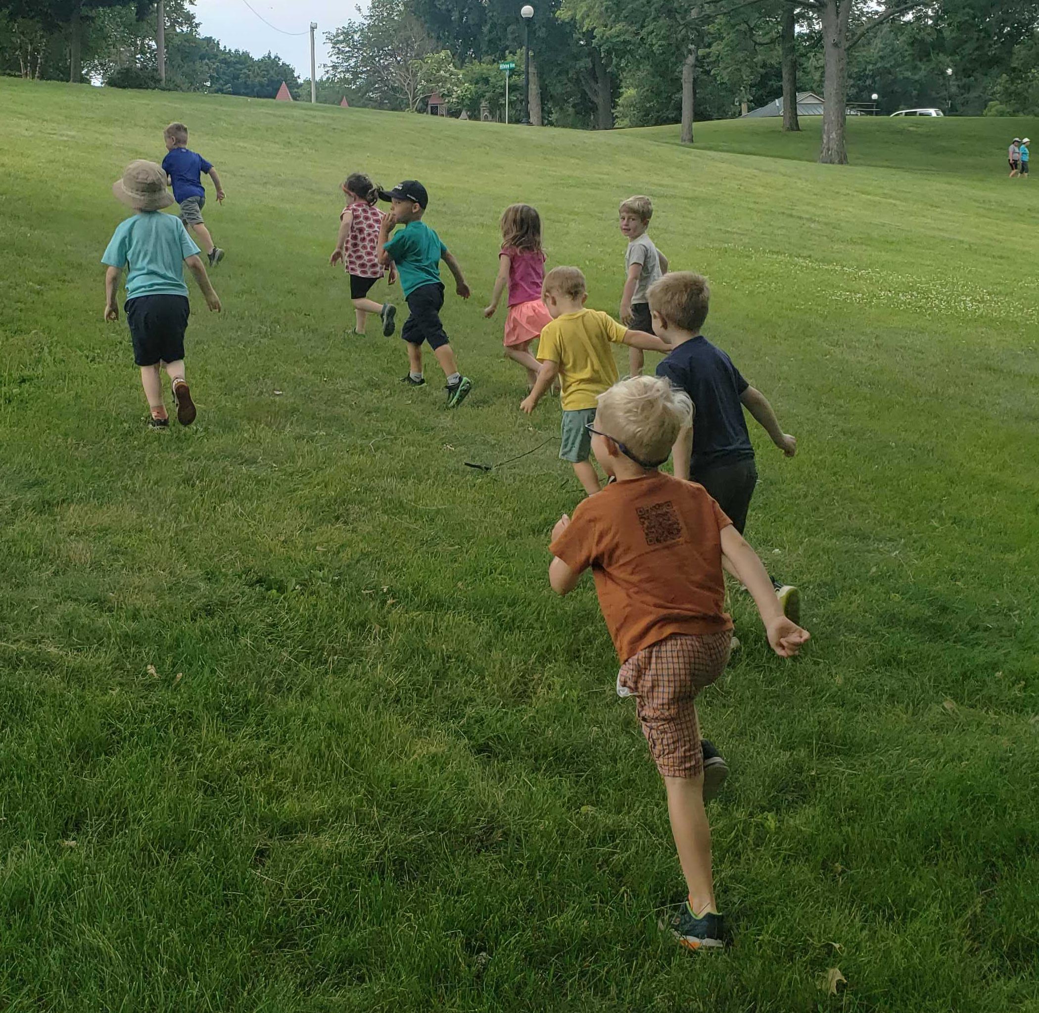 kids running on grass