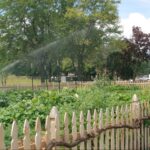 watering the demonstration garden at the nature place