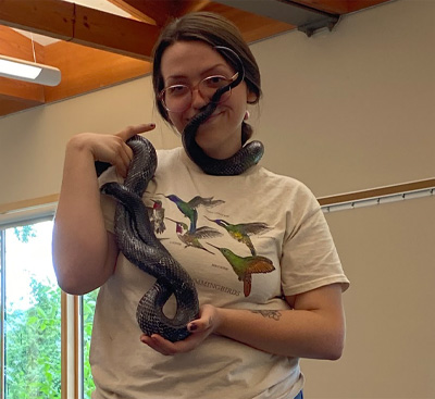 Instructor holding a snake