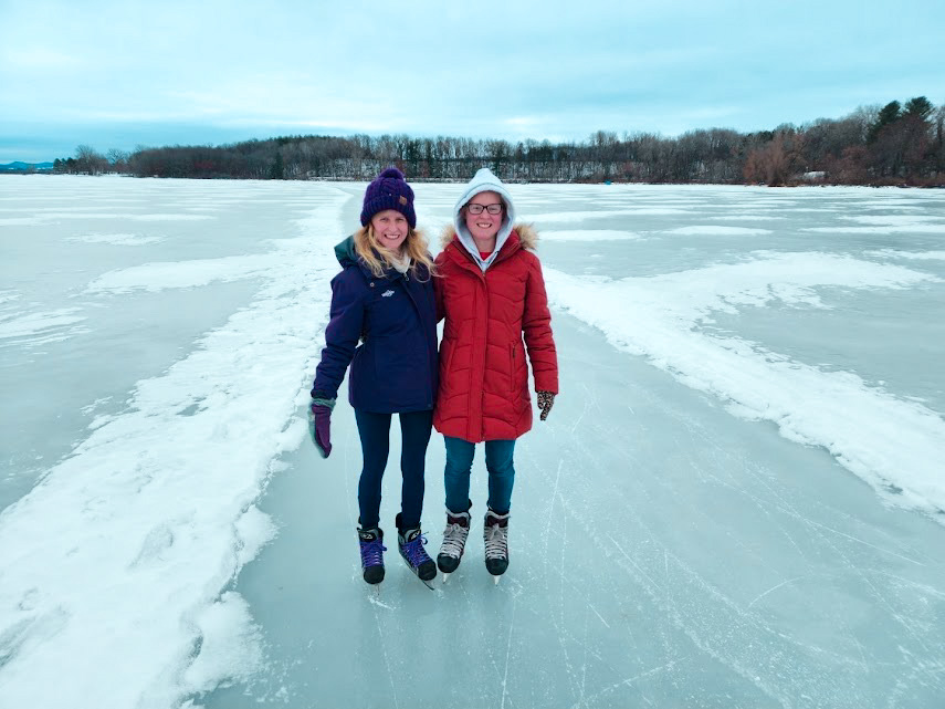 Chelsea Bruemmer, Environmental Educator, ice skating with her sisters on Neshonoc Lake.