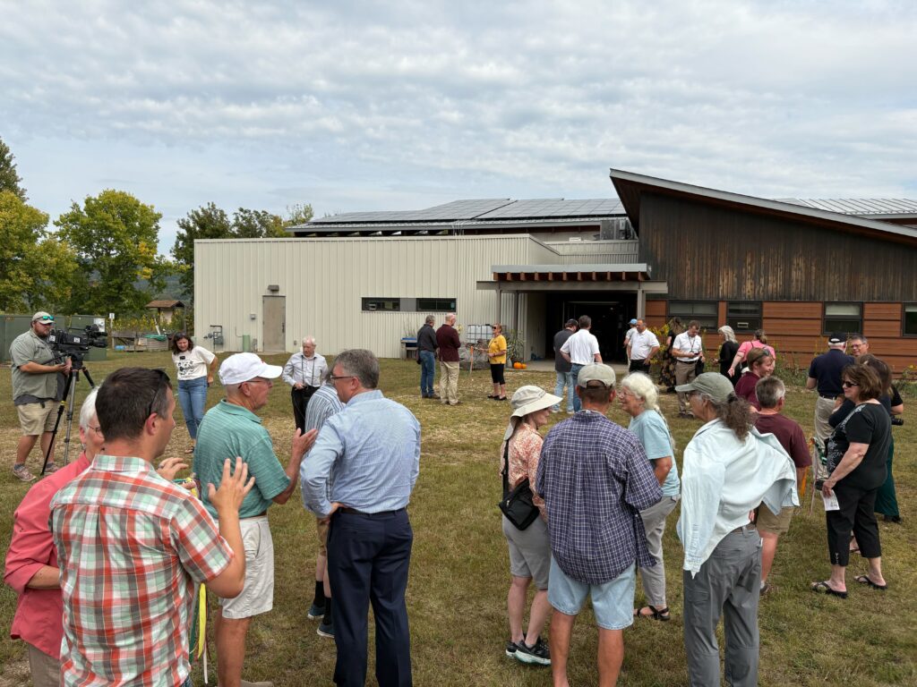 Community members gathering to celebrate the installation of the solar array at The Nature Place in LaCrosse, WI